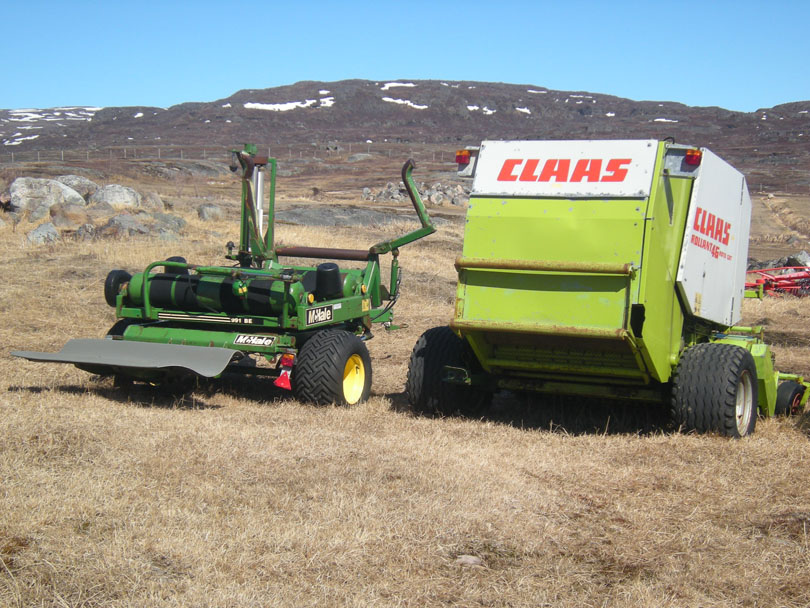 Ipiutaq guest farm, round baler and bale wrapper